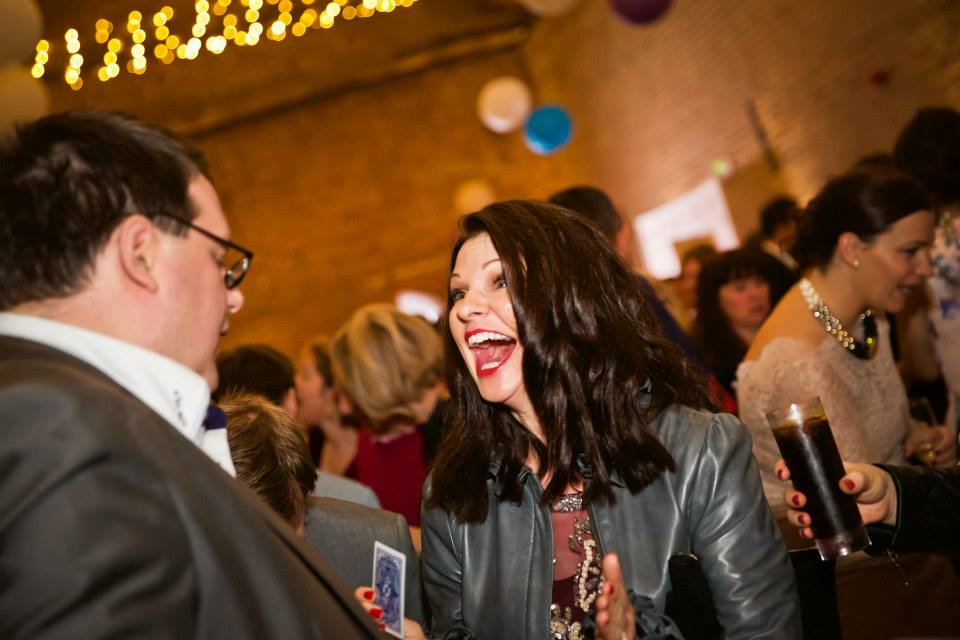 Wedding magician performing for guests